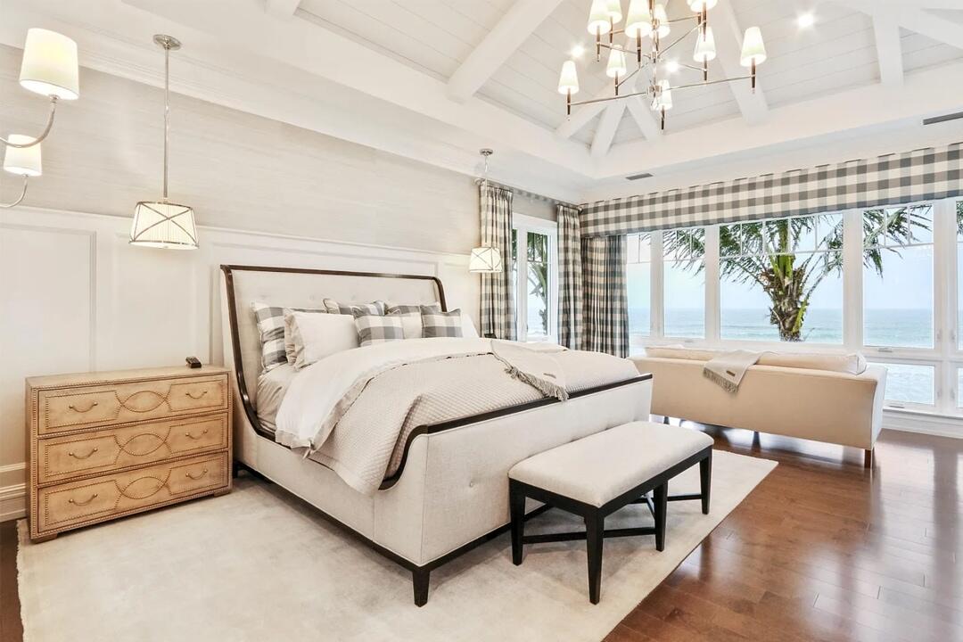 Bedroom with chandelier.